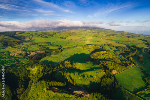 Aerial view of the landscapes on Sao Miguel Island, green farmland and volcanic mountains and lakes, Azores, Portugal