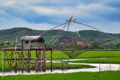 large fishing trap tool in the river   built of wood © thexfilephoto