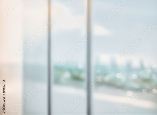 Blurred abstract glass wall from building in city town background.