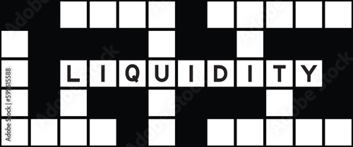 Alphabet letter in word liquidity on crossword puzzle background