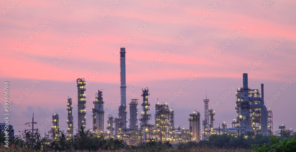 Obraz premium Oil and Gas Industrial zone,The equipment of oil refining,Close-up of industrial pipelines of an oil-refinery plant,Detail of oil pipeline with valves in large oil refinery.