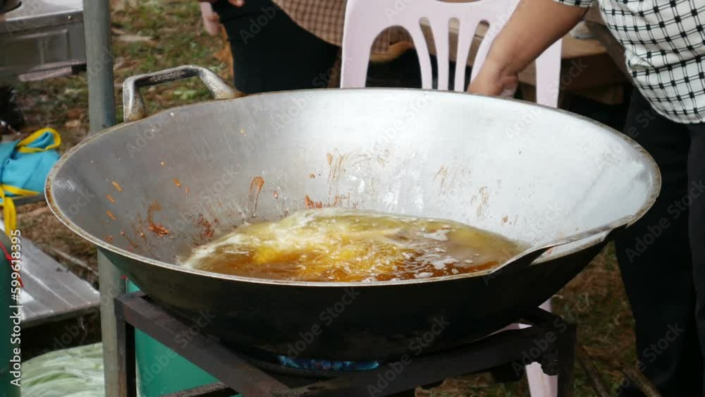 Frying pork on a frying pan , asian style food Frying pork on a frying pan , asian style food