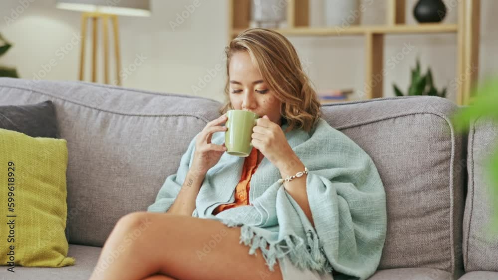 Happy asian woman drinking coffee on living room sofa for peace, calm mindset and easy lifestyle at home. Young female, relaxing and contemplating with tea, latte and hot cocoa on couch for self care