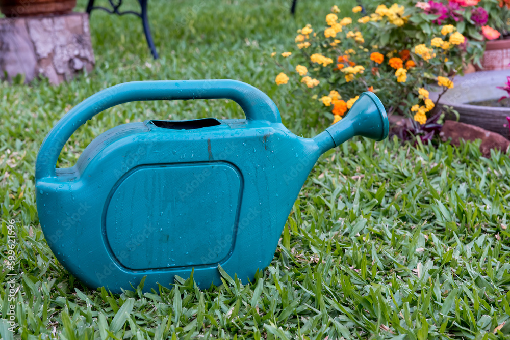 Garden waterer on top of the grass Garden waterer on top of the grass