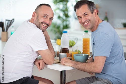 tourist men are having breakfast