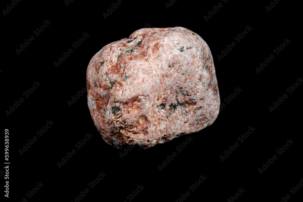 single red stone isolated on black background single red stone isolated on black background