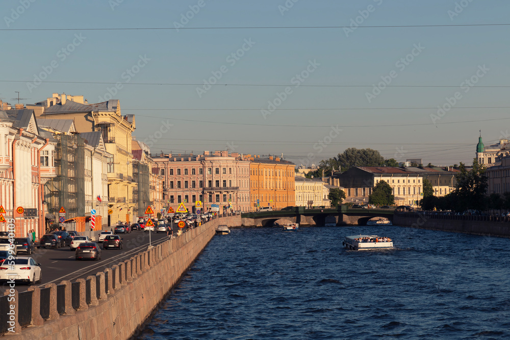 Fototapeta premium St. Petersburg, view of the river on a summer day. Houses along river on an embankment