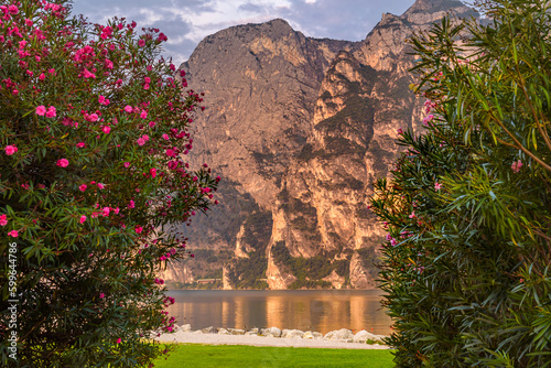 City of Riva del Garda by Garda lake in Italy. View from the lake shore