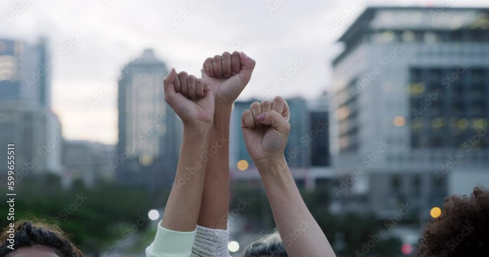 Hands, fist and people protest for justice or fight for social freedom for women empowerment in a urban city. Power, community and politics group showing strong sign for support at a rally