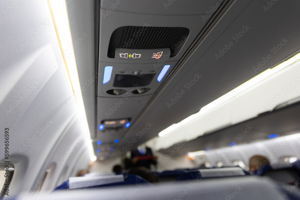 Obraz premium No Smoking Sign and Fasten Seat Belt on Board Aircraft