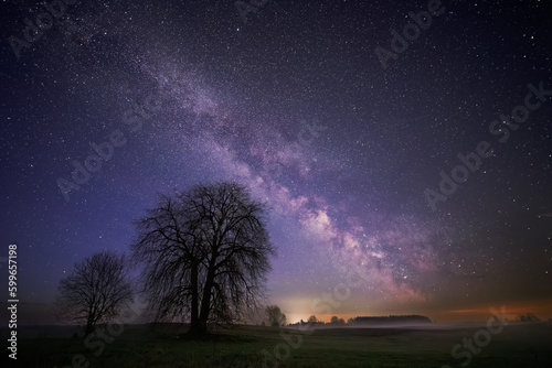 Night landscape with colorful Milky Way, spring sky
