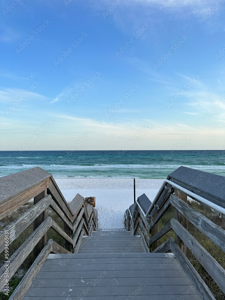 Wooden walkway with view of Gulf of Mexico water 