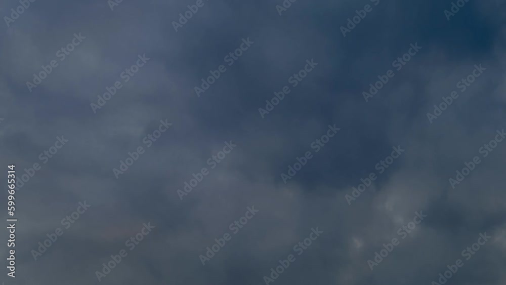 Dark clouds in a dramatic sky. Storm clouds of deep blue color. timelapse Dark clouds in a dramatic sky. Storm clouds of deep blue color. timelapse