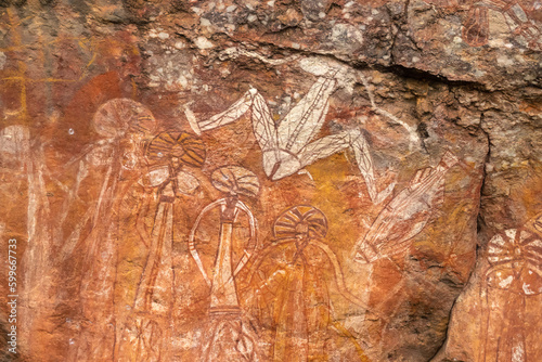 Rock art at Nanguluwurr or Nanguluwu (Nourlangie) in caves and shelters, Arnhem Land Escarpment, Kakadu National Park, Northern Territory, Australia photo