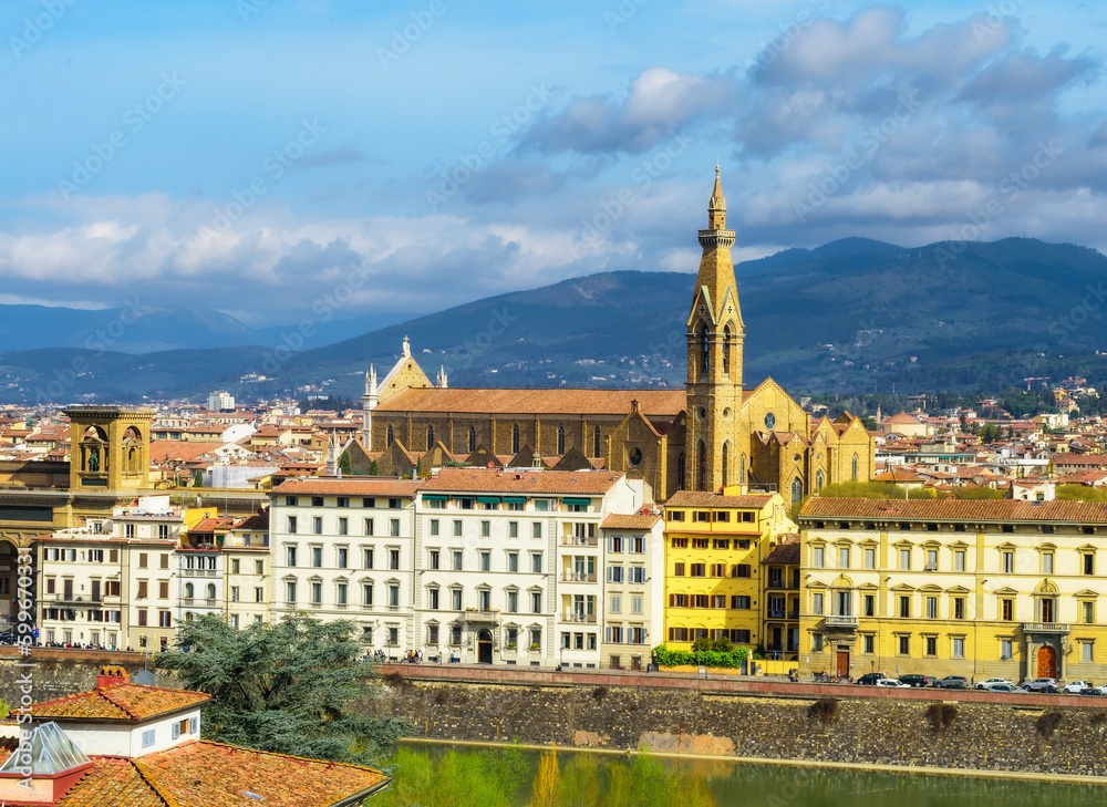View of the Basilica of Santa Croce in Florence, Tuscany, Italy. The church on blue sky background at summer. Florence is a popular tourist destination of Europe.