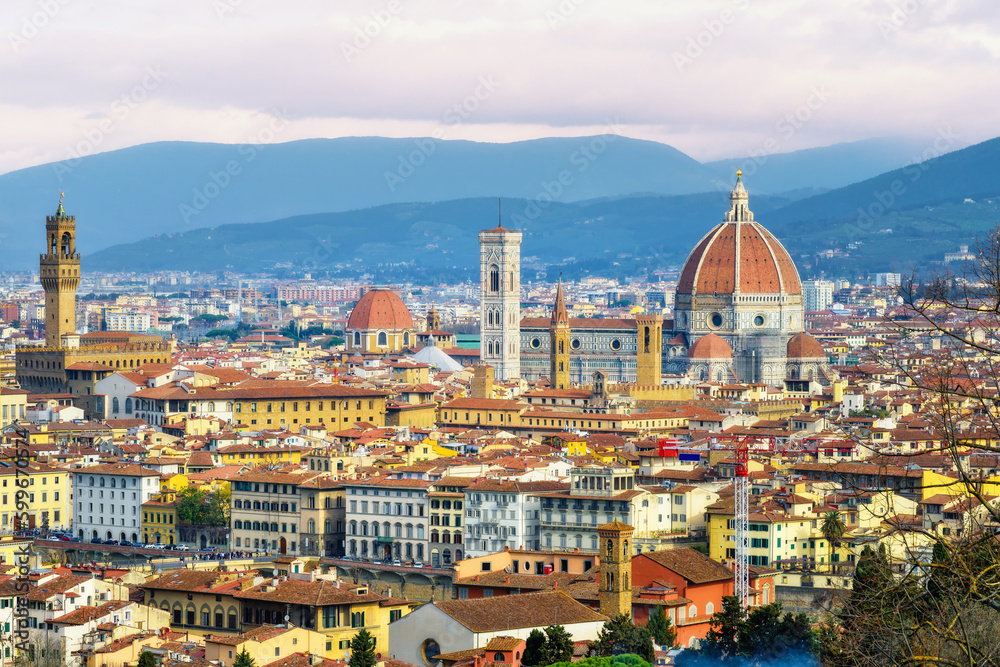 Panoramic view of old town of Florence with Dome of Florence Duomo or Basilica di Santa Maria del Fiore cathedral, Tuscany. Italy in a beautiful summer day