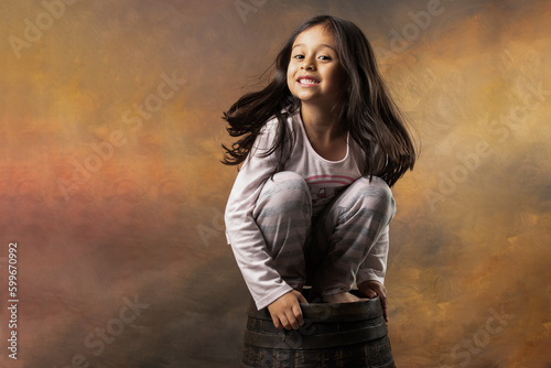 girl in pajamas posing and turning her face