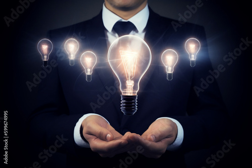 Generative AI Businessman Holding Glowing Lightbulb- Creative Thinking and Problem Solving 