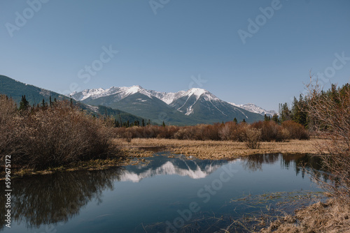 reflection in the lake in the Canadian Rocky Mountains in Alberta Canada, near Canmore and Banff 