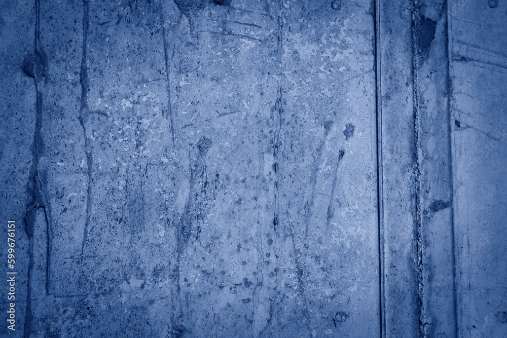 Blue decorative plaster texture with vignette. Abstract grunge background with copy space for design.