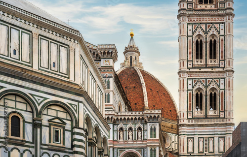 Cathedrale of Santa Maria del Fiore, Brunelleschi Dome, Giotto Campanile with details of the exterior - is a masterpiece of Renaissance art. Close-up.  photo