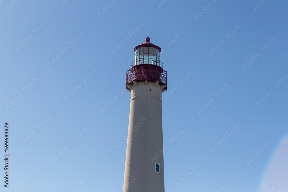 This is Cape May point lighthouse in New Jersey. I love the white look of its tower and the red top to it that stands out from so many.  This beacon of hope helps people at sea to navigate.