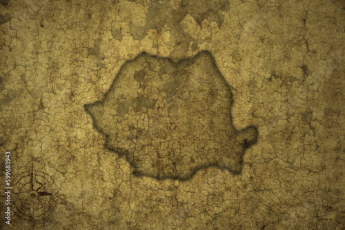 map of romania on a old vintage crack paper background .