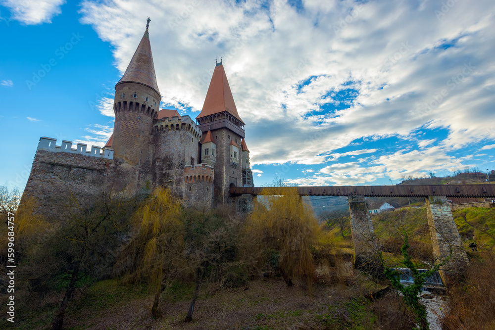 The Corvin or Hunyadi castle (Castelul Corvinilor or Huniazilor) is a Gothic-Renaissance castle with wooden bridge in Transylvania, Romania, one of the largest in Europe. Traveling concept background