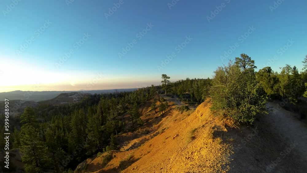Timelapse Panning A Setting Sun Over A Dramatic Canyon Valley - Bryce Canyon, Utah Timelapse Panning A Setting Sun Over A Dramatic Canyon Valley - Bryce Canyon, Utah