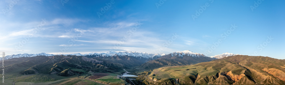Aerial view of the Tian Shan hills and mountains captures the striking ruggedness and beauty of the region