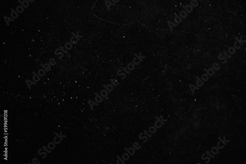The black texture of the walls as a background overlay for your design, with a grunge texture with scratches and spaces to copy. High quality photo
