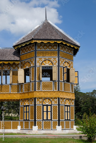 Istana Kenangan. A pagoda of an old Royal Palace which is built up of bamboo and wood is full of art carving detail and is located in Kuala Kangsar, Perak, Malaysia. photo