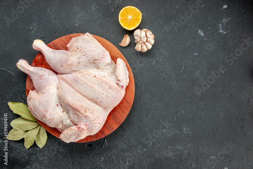 top view fresh chicken on dark background cooking dish salad color dinner bird barbecue food