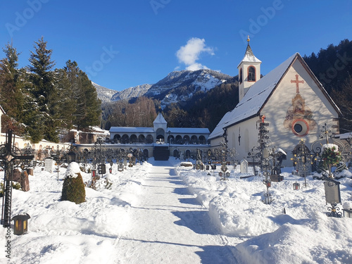 Cemetery of the city of Ortisei on a sunny winter day.