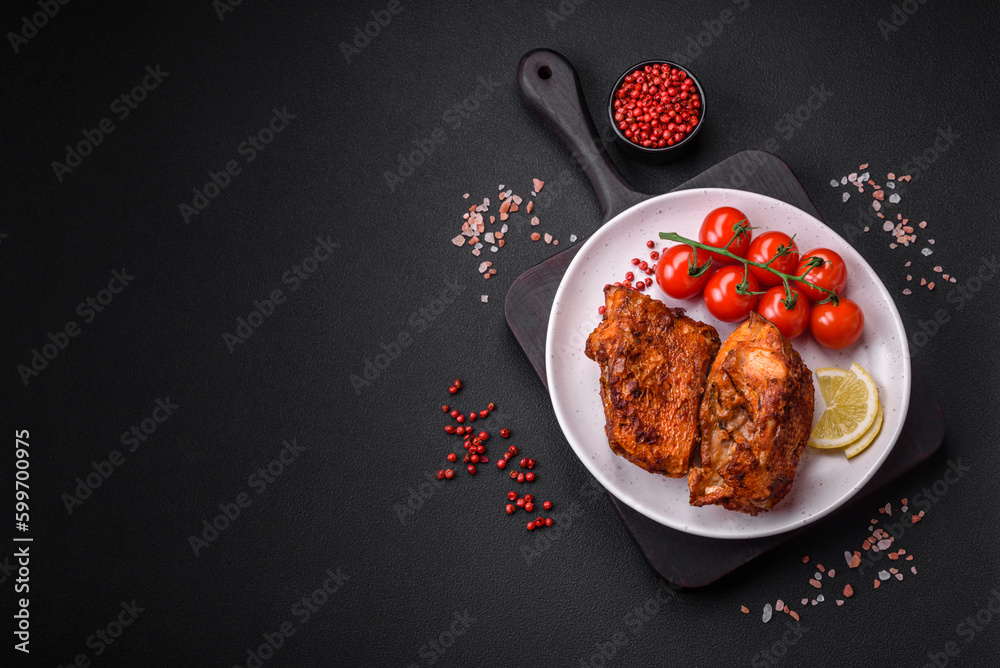 Delicious fried sea bass fish in the form of slices with spices and herbs Delicious fried sea bass fish in the form of slices with spices and herbs