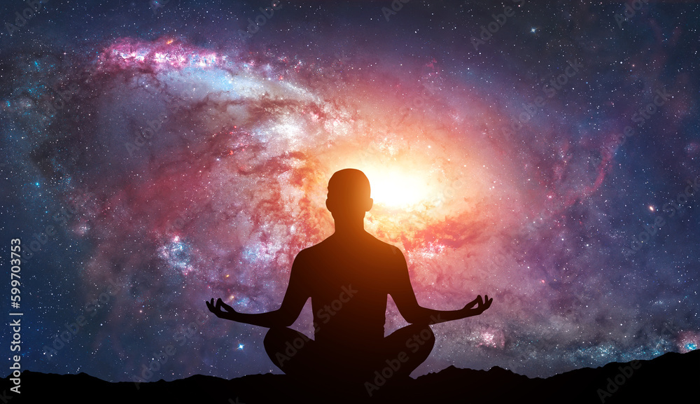 Silhouette of human sitting on stars background. Meditation in yoga. Psychology and relax