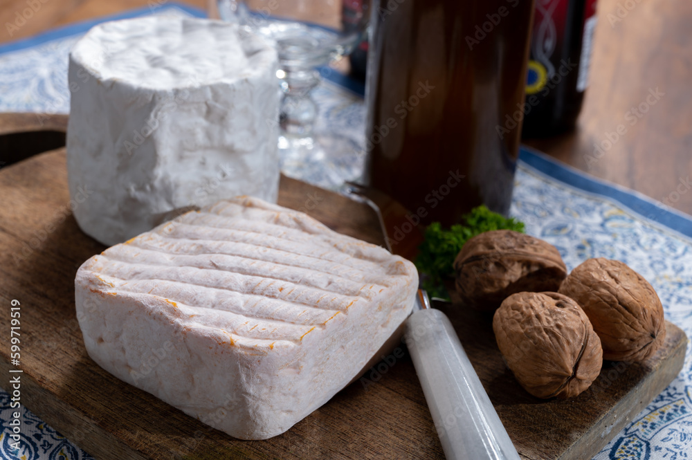 Cheese collection, Belgian soft yellow cow milk cheese with white mold from Bruges and bouquet des moines from Abbey of Val-Dieu Cheese collection, Belgian soft yellow cow milk cheese with white mold from Bruges and bouquet des moines from Abbey of Val-Dieu