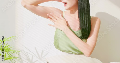asian female touch armpit photo