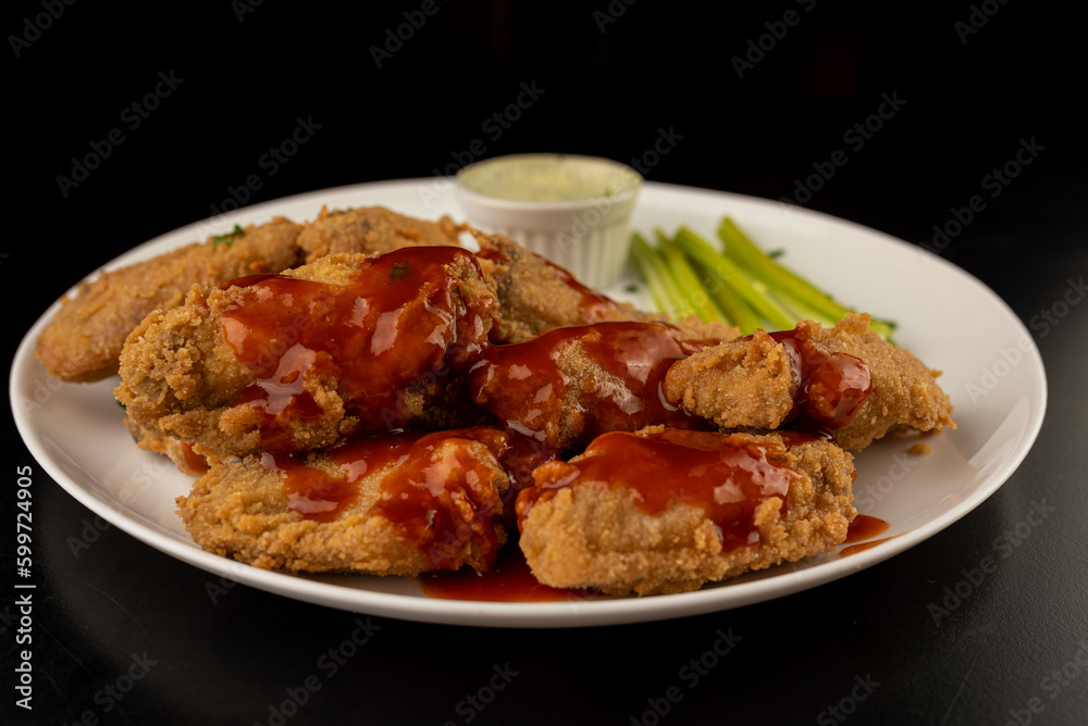 Petisco - Chicken wing seasoned and breaded with sour cream and spicy sauce Petisco - Chicken wing seasoned and breaded with sour cream and spicy sauce