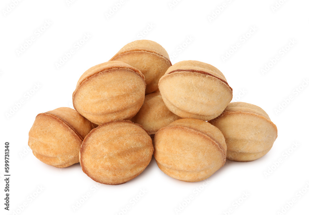 Delicious nut shaped cookies with condensed milk on white background Delicious nut shaped cookies with condensed milk on white background