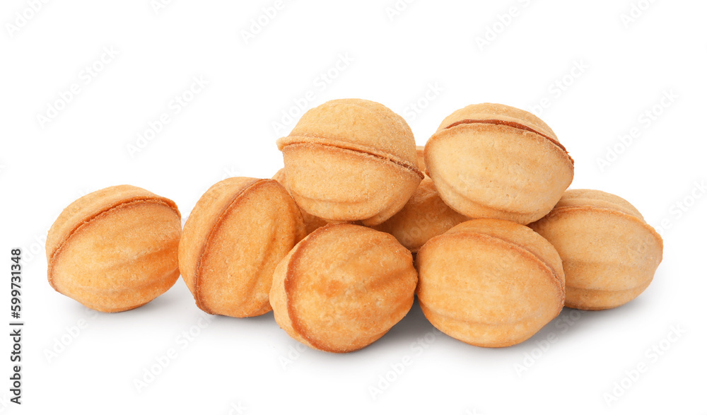 Delicious nut shaped cookies with condensed milk on white background