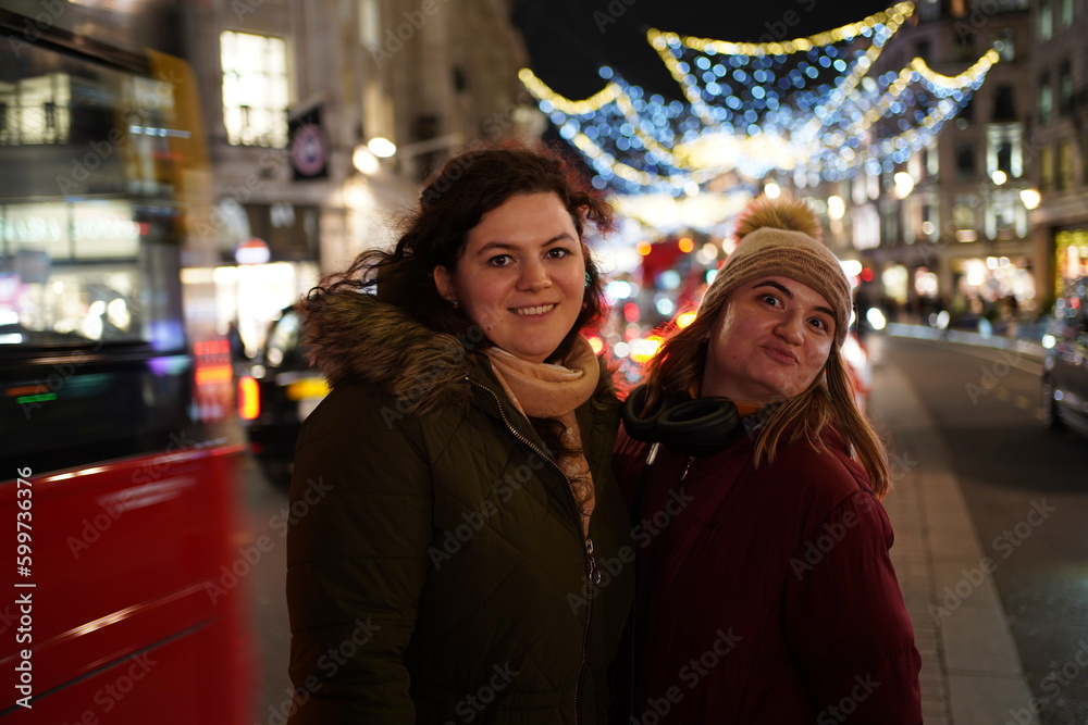 Happy girls on Christmas night Happy girls on Christmas night