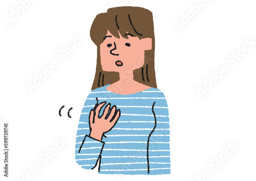 乳房にしこりがないか触って調べている女性
