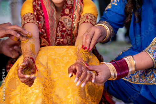 Indian Punjabi pre wedding Maiyan ceremony rituals hands close up