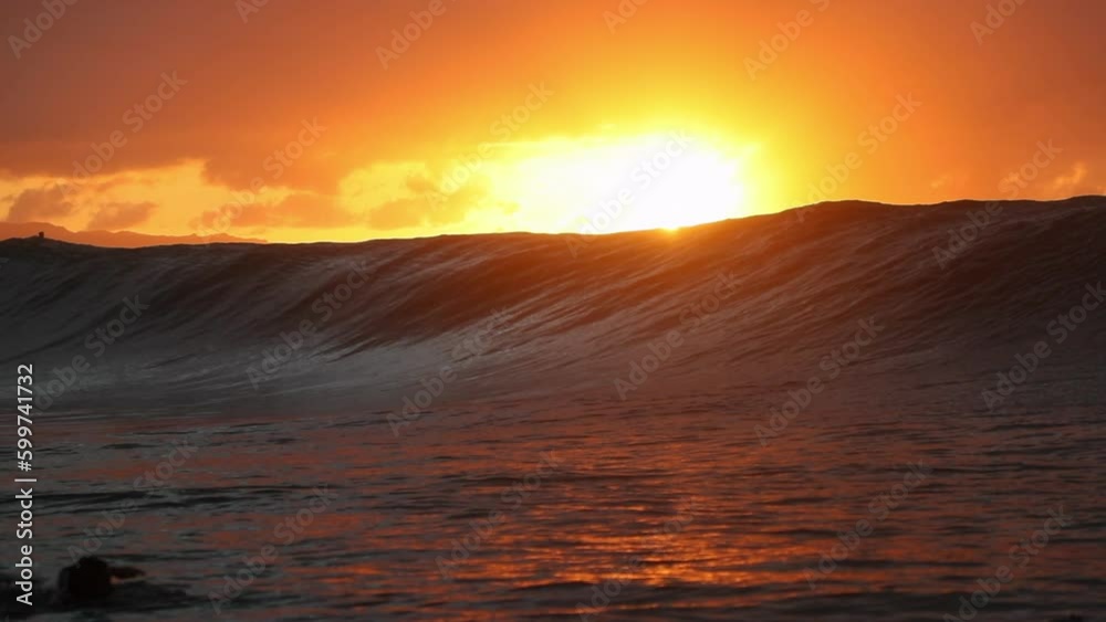 Slow Motion Shot Of Tourists Swimming With Surfboards On Sea During Sunset - Oahu, Hawaii