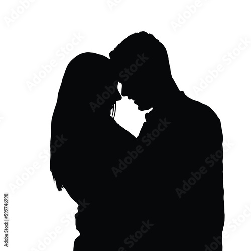 Silhouette of loving couple man and woman hugging. Silhouettes of Love