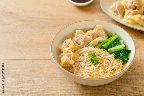 egg noodles with pork wonton soup or pork dumplings soup and vegetable