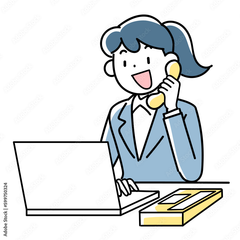 パソコンを見ながら笑顔で電話対応するビジネスウーマン