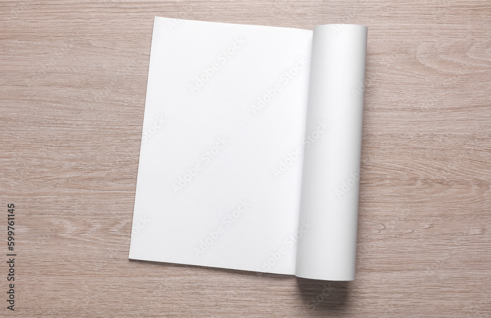Blank magazine or notebook on the table. Template for design, layout. Blank magazine or notebook on the table. Template for design, layout.