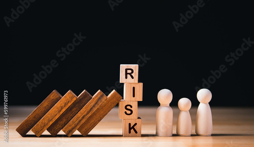 Financial Crisis, Economic, Business risk management concept. Risk word on wooden block, domino crisis effect. Concept Risk, Crisis, Management, Assessment, Insurance, Security, Financial, Economic
